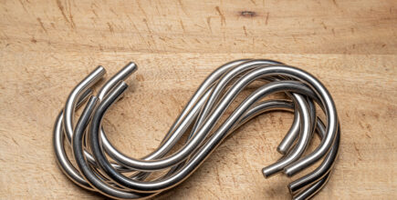 Several stainless steel S-shaped forms